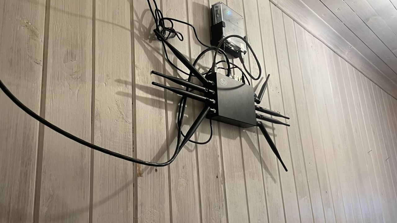Banana Pi BPi-R3 mounted on the wall, running a full home network